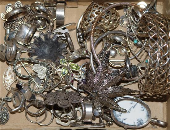 A quantity of silver jewellery including rings and bangles.